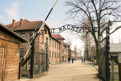 Auschwitz Birkenau Transfer and Guide with Salt Mine Combo Option - Stop 1: Auschwitz I and why headsets change everything