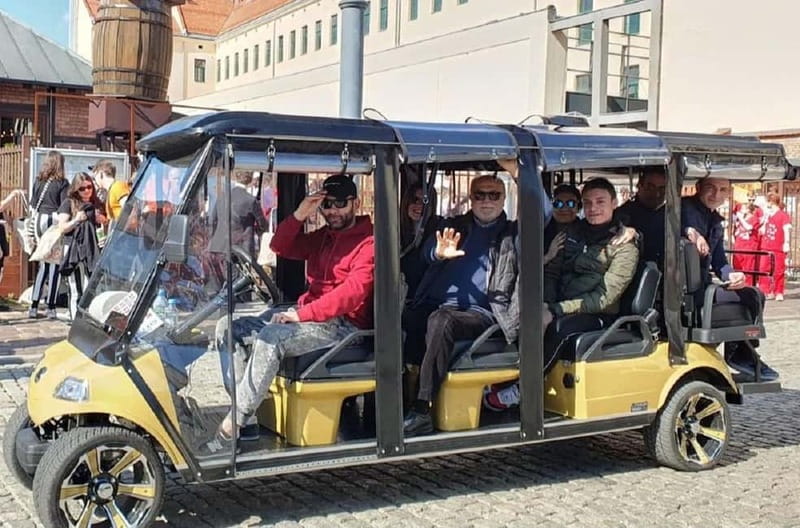 City Tour Cracow golf car plus Cruise on the Vistula River. - Kazimierz Jewish district stops: synagogues, Plac Nowy, and Wolnica Square