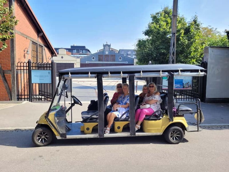 Cracow sightseeing tour by electric golf cart - Audio guide + driver Q&A: how to get the most from the format