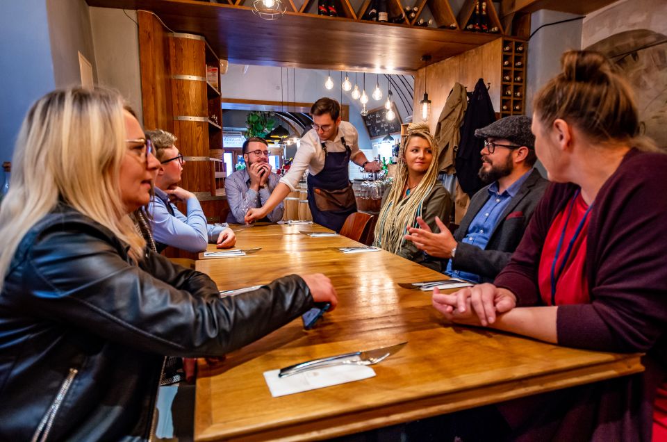 Krakow: Guided Wine Bar Tour with Tastings and Snacks - The Old Town walk between tastings: a quick change of setting