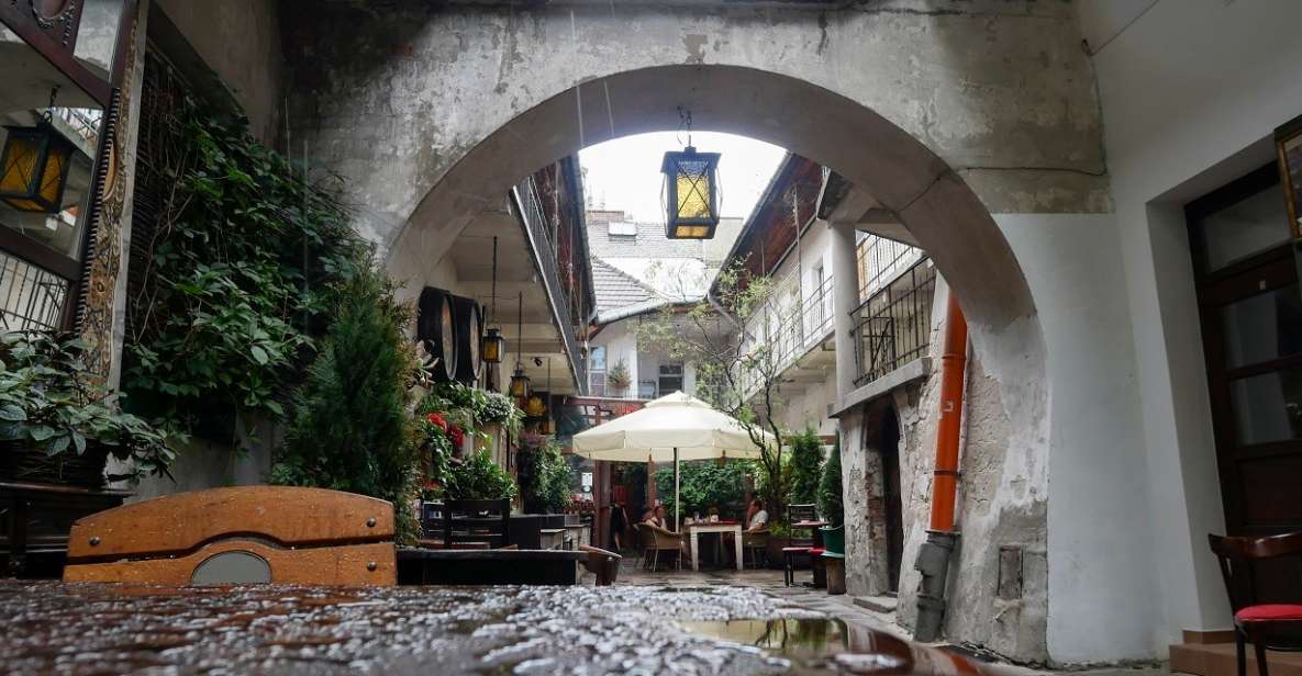 Krakow: Kazimierz, Schindler's Factory & Ghetto with Guide - The Former Ghetto Sites: Walls, Homes, and the 68 Chairs Monument