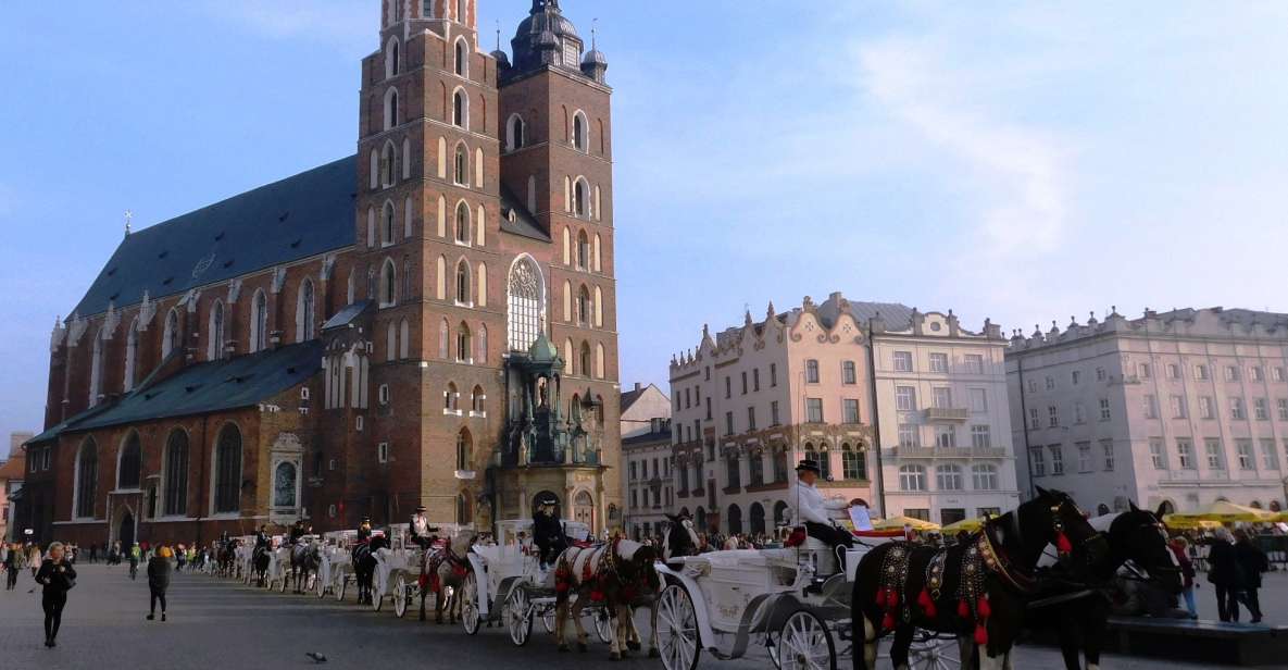 Krakow Old Town and Jewish Quarter in one guided walk - Main Market Square: St. Mary’s, the Cloth Hall, and the Town Hall Tower story