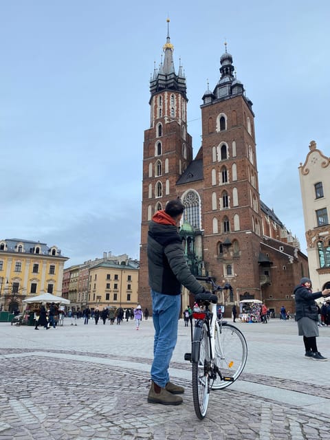 Krakow: Old Town and Kazimierz Guided Bike Tour - Jagiellonian University, Wawel Dragon, and views along the river