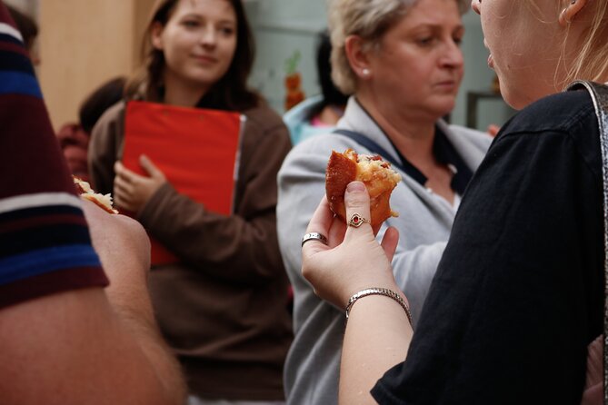 Krakow: Street Food Tasting Walking Tour - Cured meats and kiełbasa: a savory stop that defines the menu