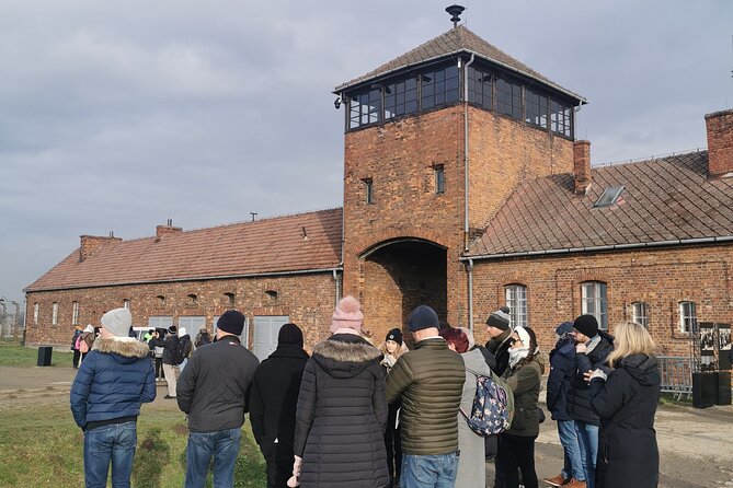 Krakow to Auschwitz Birkenau Guided Tour with Transfer and Ticket - Auschwitz I: headsets, the gate, and the story you can’t unlearn