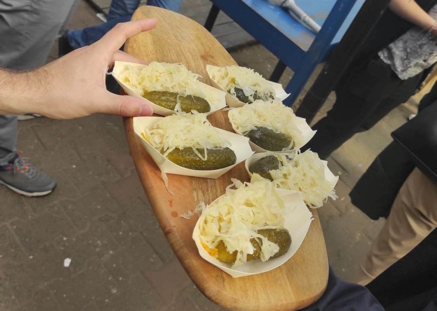 Krakow: Traditional Street Food Walking Tour - Vodka, cheese, and sweets: how the tasting balances itself