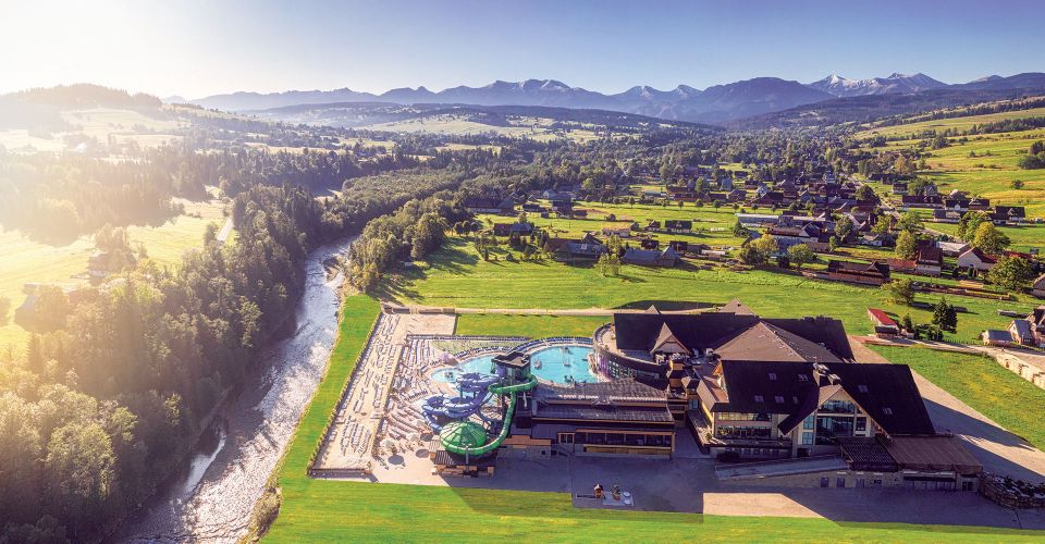 Krakow: Trip to Chocholow Thermal Baths in Tatra Mountains - Outdoor water fun: Wild River, water games, and slides with seasonal timing