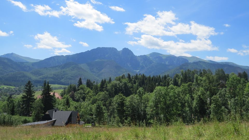 Krakow: Zakopane, Thermal Baths, Cable Car, Vodka, Oscypek - Chocholowska Thermal Baths: warm water, mountain views, and crowds