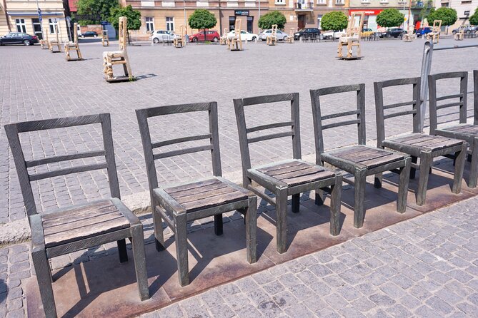Schindler's Factory and Jewish Ghetto Walking Tour in Kraków - Ghetto Heroes Square and the chair memorial: how open space tells a hard story