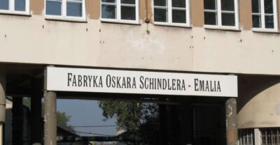 Schindler's Factory + Ghetto in Krakow and Wieliczka Tour - Walking Podgórze ghetto streets: wall fragments, everyday locations, and one hard symbol