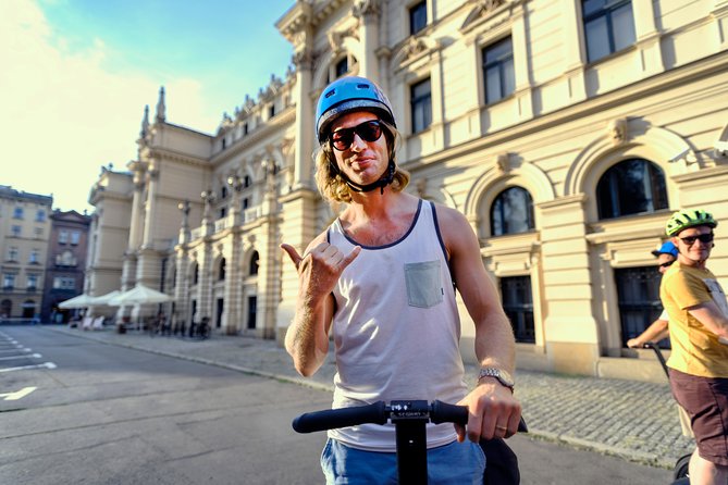 Segway Tour of Krakow: Full Tour (Old Town + Jewish Quarter) - 3-Hours of Magic! - Collegium Novum and the university clock’s dragon moment