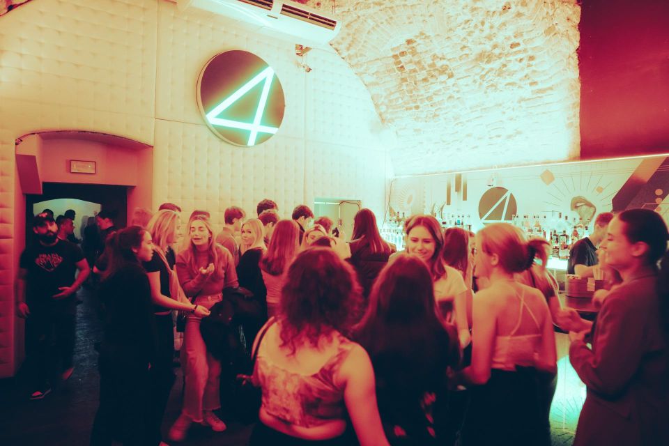 VIP Club Entry and Booth Booking - Four Music Club Atmosphere: DJs, Lights, and Old Town Energy