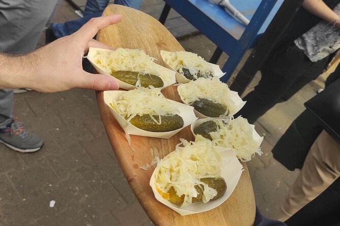 Walking Guided Tour with Street Food in Krakow - How a 90-minute street food walk works in Kraków