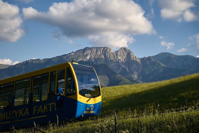 Zakopane and Hot Springs from Krakow Full-Day Tour - Chochołów: Oscypek cheese and wooden village traditions